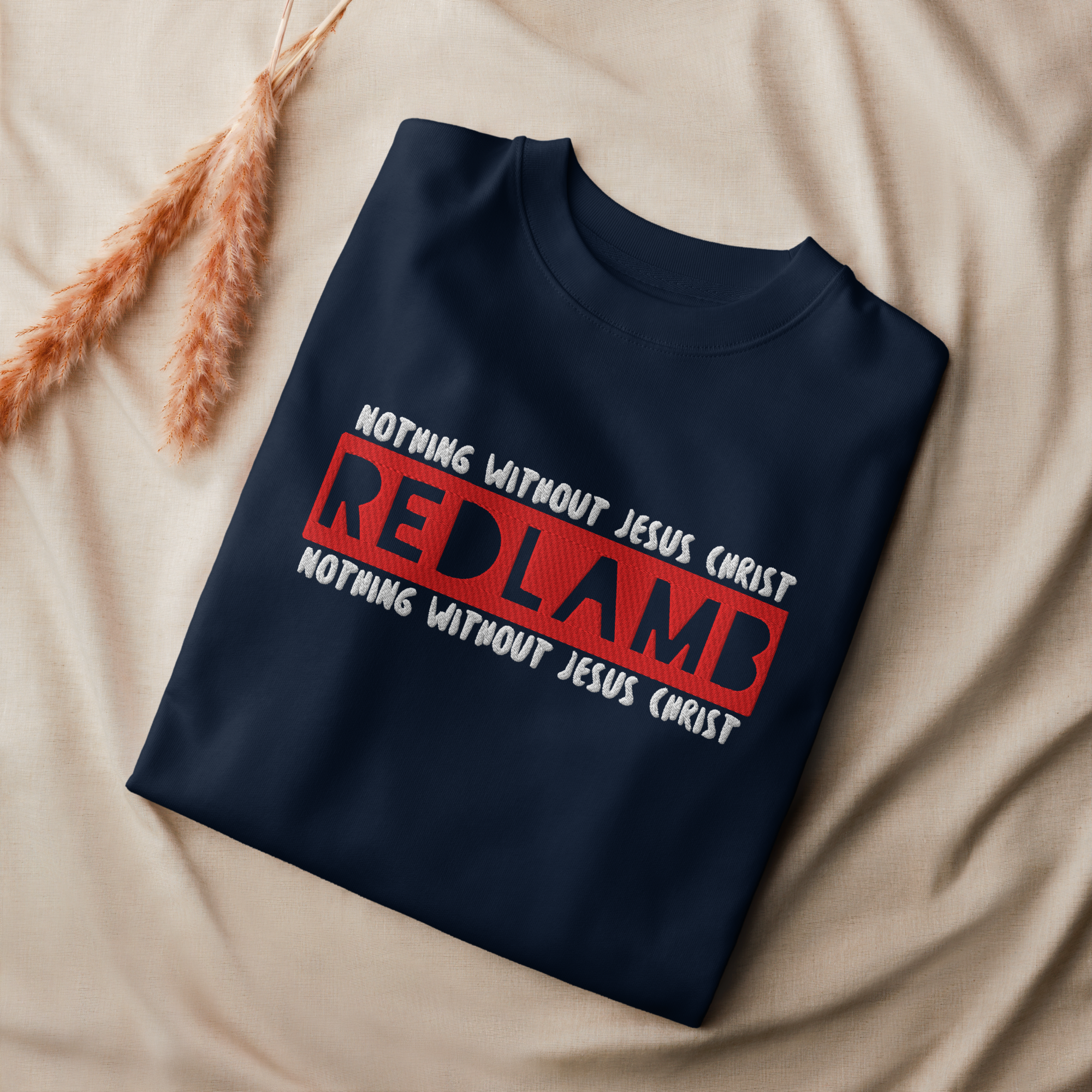 High Quality Christian sweatshirt with "nothing without Jesus Christ" embroidered on it, along with the brand name "redlamb"